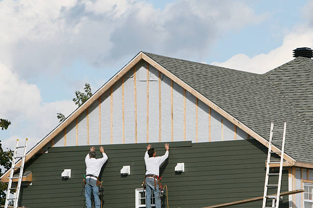 Professional Siding Contractor technician working in Avon, OH